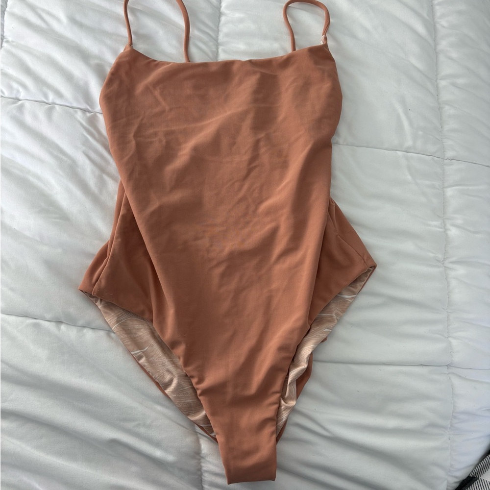 the girl and the water one piece